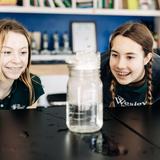 The Wesley School Photo #14 - Hands on learning in science class creates excitement in two middle school students.