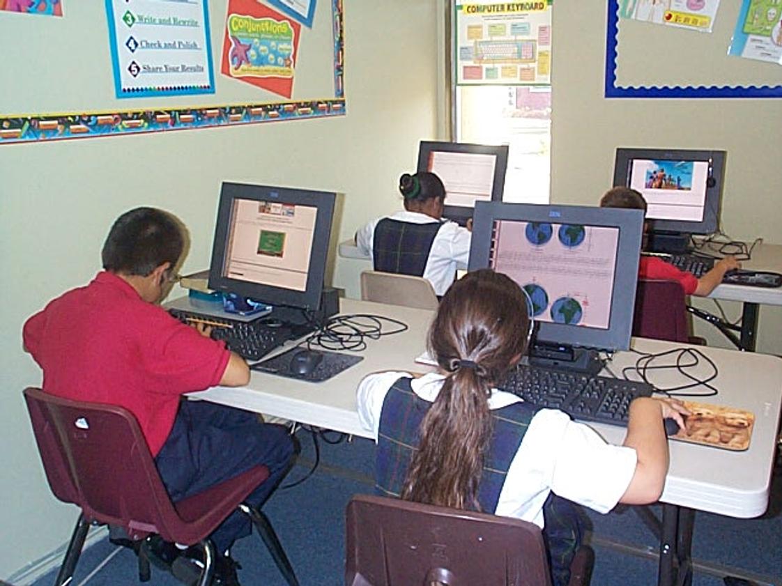 South Bay Christian Academy Photo - Students working on computers in the Elementary classroom