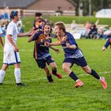 International School Of Indiana Photo #6 - The Boys Varsity Soccer team celebrating after a goal. ISI offers over 30 athletics team opportunities in the Upper School.