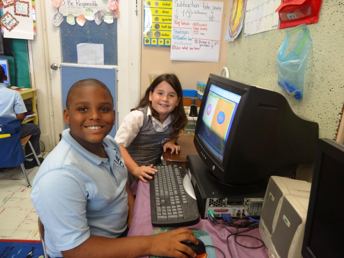 St. Anthony School Photo #1 - First graders use computer skills.