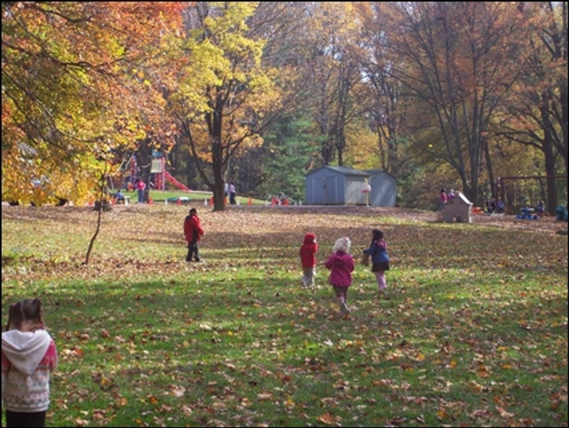 Early Childhood Center Photo #1 - The Early Childhood Center preschool students enjoying fall colors while playing on the playground!