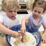 Evergreen School Photo #7 - At Evergreen, learning is hands-on, collaborative, and joyful-even in the kitchen! Our students explore math, science, and practical life skills through meaningful real-world experiences. Whether mixing ingredients or sharing tools, they're building independence and community with every stir.