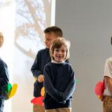 Gilman School Photo - Gilman's Early Childhood Program embodies joy, happiness, and excitement. Our lessons promote exploration and discovery, resulting in a lifelong spirit of inquiry and learning. Here, Pre-K students perform a Thanksgiving dance for their grandparents/grandfriends.