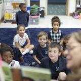 Grace Episcopal Day School Photo #3 - Each morning, Grade 1 students join together on the rug for their morning meeting, which always includes integrated skills development as well as an active game at the end.