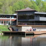 Park School of Baltimore Photo #3 - Kindergarten students take nature walks along the decks overlooking the pond, investigating wildlife, while Middle Schoolers eat lunch together, and Upper Schoolers take a break outside between classes.