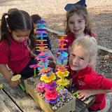 St. Martin's-in-the-Field Episcopal School Photo - Our Preschoolers enjoying new innovation toys out on the playground.