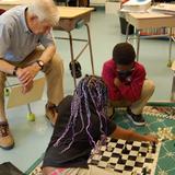 Washington New Church School Photo #8 - Learning from the best! - retired doctor volunteers to teach chess to 3rd & 4th graders.