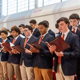 Catholic Memorial Photo #10 - The school choir sing during Mass.
