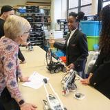 Sacred Heart Elementary School Photo #10 - Scholars explaining their STEM projects to faculty, staff & parents during STEM Night.