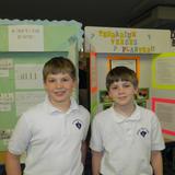 Sacred Heart Continuation School Photo #4 - 5th grade students exhibit their science projects during the annual science fair.