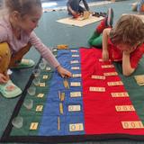 Christian Montessori School Of Ann Arbor Photo #10 - 45 layout work. Counting 1 - 900.