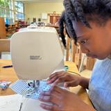 Christian Montessori School Of Ann Arbor Photo #13 - Sewing in Elementary.