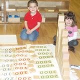 Midland Montessori School Photo #6 - Doing the 45 Layout: A bird's eye view of the decimal system.