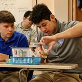 Nouvel Catholic Central High School Photo #8 - Students work together in the Science classrooms