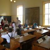 St. John Lutheran School Photo #5 - Third grade students visit a nearby one-room schoolhouse and historical museum as part of their study of Michigan History. Each grade level participates in various field trips throughout the school year.