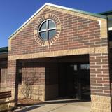 Wixom Christian School Photo - School features a full size gym, large preschool play area, playgrounds and up to date technology all with a Christian basis.