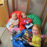 All Saints Catholic Church School (K-8) Photo #2 - Hanging out in the reading nook in Preschool.
