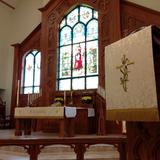 St. Johns Lutheran School Photo #4 - The altar and Good Shepherd window in the sanctuary