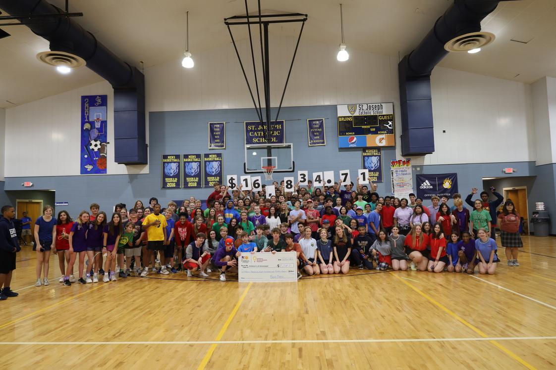 St. Joseph Catholic School Photo #1 - St. Joseph Catholic School's annual year-long, student-led fundraiser culminates with a dance marathon and celebration of money raised that is donated to Batson Children's Hospital. Since the project began in 2016, endless prayers and over $125,000 has been donated.