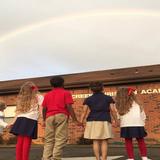 Cross Creek Christian Academy Photo - Students admiring a beautiful rainbow God has provided after a rainy afternoon.