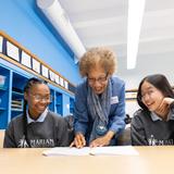 Marian Middle School Photo #7 - Students with teacher