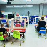 Immanuel Lutheran School - Olivette Photo #2 - an example of our Kindergarteners at their tables with our re-opening precautions in place of table dividers and face masks.
