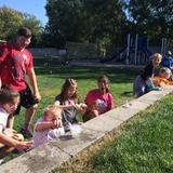 St. John Lutheran School Photo - St. John's 6th-grade dry ice science experiment in front of the outdoor classroom.