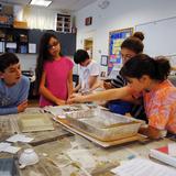 Jewish Community Day School Photo #7 - Middle School students run an experiment in their science classroom.