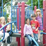 New World Montessori School Photo #8 - Outdoor play is great for developing large motor skills and socializing.