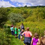 Fields Of Green Montessori School Photo #5 - Hiking with the students as a part of our Physical Education curriculum.
