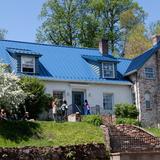 Blue Rock School Photo #2 - Blue Rock's Farmhouse School Building, is one of three buildings, set on our beautiful, wooded campus.