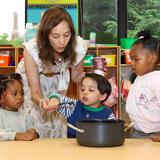 Buckley Country Day School Photo #4 - Pre-Nursery students explore early science and life skills as they learn how apples are transformed into homemade applesauce.