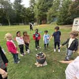 Riverdale Country School Photo #19 - As part of their study of systems, 2nd graders explored how a campfire functions, safely observing how its parts work together.