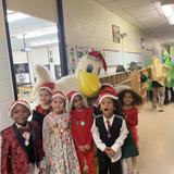 Sacred Heart School Photo #9 - 1st graders after their performance in the annual Christmas Show with Patrick the Pelican, our mascot. Even Patrick had a Santa hat.