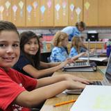 Grace Christian School Photo #9 - 3rd grade using Chromebook laptops