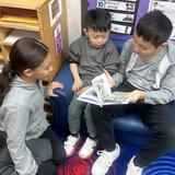 Transfiguration School Photo #15 - Older students reading to their younger schoolmates
