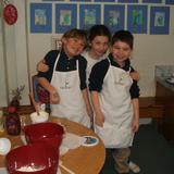 Thevenet Montessori School Photo #7 - Lower elementary students baking a birthday cake