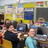 Zion Lutheran School Photo #3 - Students of Zion take a math break with Math Munchers on the school's laptops.