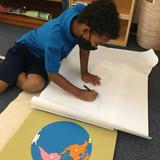 Montessori School Of Durham Photo #10 - From Early Childhood to Elementary, mapmaking develops from pin-punching work to a tracing work. Students at all levels make beautiful maps!