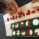 Montessori School Of Durham Photo #9 - The Montessori math materials offer tangible practice as students develop an understanding for concepts.