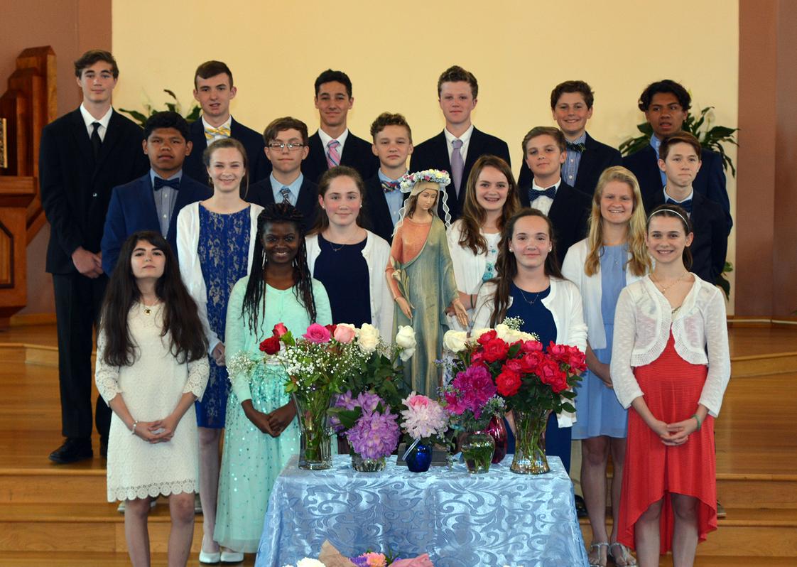 Our Lady Of Mercy Catholic School Photo #1 - Eighth graders lead our school's annual May Crowning ceremony each May. Passing on the Christian faith is central to who we are.