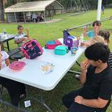Pathway Christian Academy Photo #5 - Students are enjoying a picnic on a beautiful day!