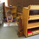 Pinewoods Montessori Schoolcorp Photo #6 - There's always a quiet place for a child to explore what truly captures her imagination.