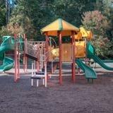 Hill Learning Center Photo #2 - Students at Hill enjoy the playground and basketball court during recess.