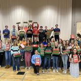 East Richland Christian Schools Photo #6 - Junior High and High School students present packed shoeboxes for Operation Christmas Child.