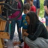 Western Reserve Academy Photo #9 - Small-town charm meets campus tradition. Each fall in Hudson, students pick apples from our grounds, press them with Dr. Borrmann's cider press, and share cups at the local farmers market - blending Reserve spirit with community life.