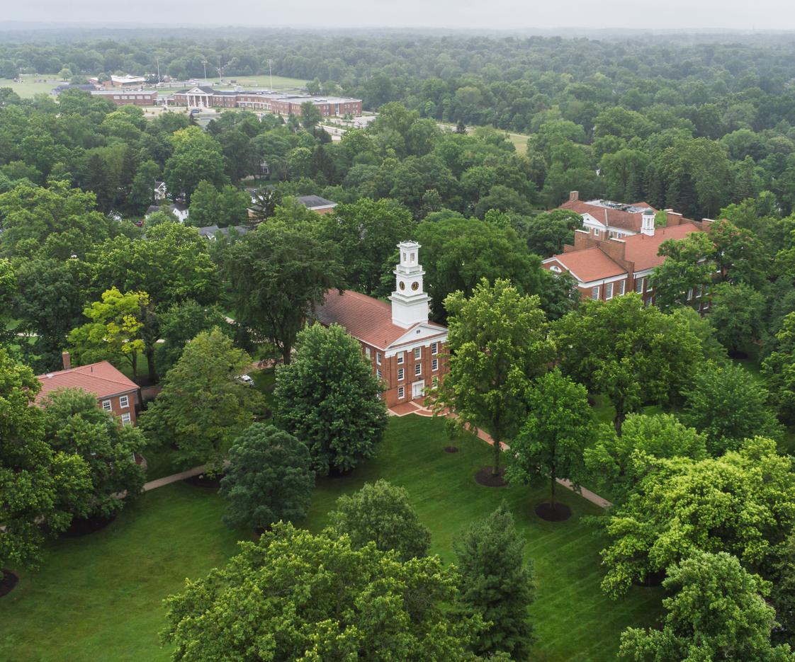 Western Reserve Academy Photo #1 - Brick Row from above - a timeless view of our Federal-style red brick and white pillars, echoing our 1826 founding. A historic institution with modern amenities and an eye on the future.