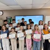 Metro Christian Academy Photo #17 - Metro Christian's 6th-grade English classes received certificates to recognize their achievement of reading the entire Book of Psalms this year. They read one or two chapters each day until they finished the whole book together.