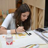 French International School of Oregon Photo - An eighth-grade student takes a Chinese painting class during the eighth-grade international trip to China. Eighth graders can travel to one of five different countries on their international trips.