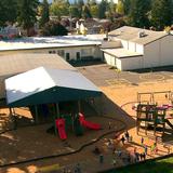 Portland Christian Elementary School Photo #10 - Birds eye view of preschool and elementary playground and school buildings in the background